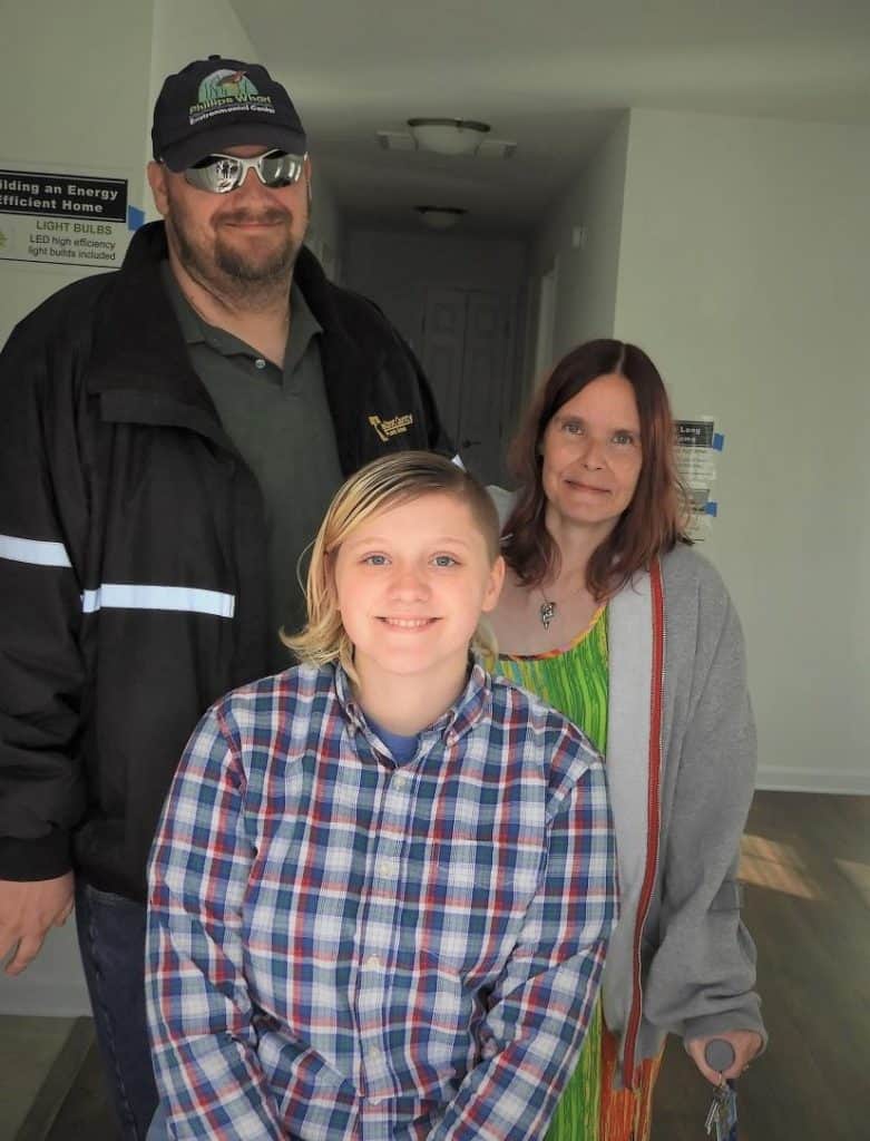 Everyone deserves a decent place to call home; the Hoffs now have just that! Pictured above is the family with the keys to their new home.